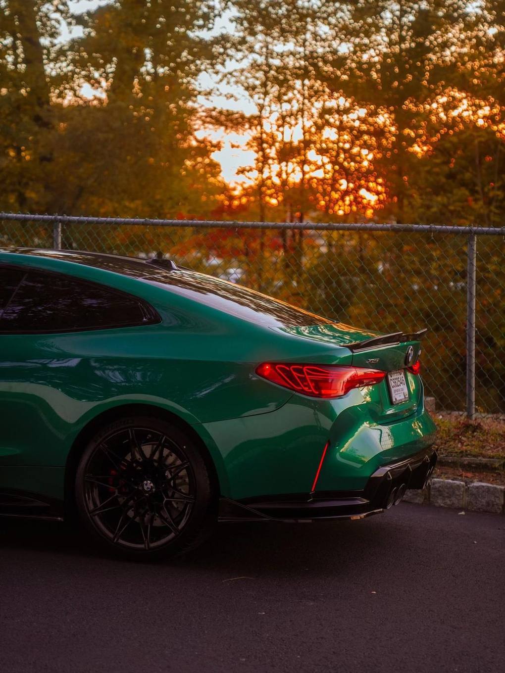 Gloss green wrap · sport sedan
